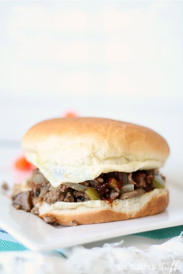 philly cheesesteak sloppy joes on a white plate