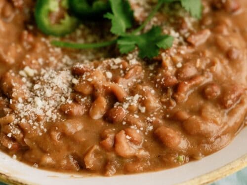 https://www.sixsistersstuff.com/wp-content/uploads/2011/07/Slow-Cooker-Refried-Beans-in-Bowl-500x375.jpg