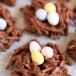 Chocolate bird nest cookies topped with egg shape candies.