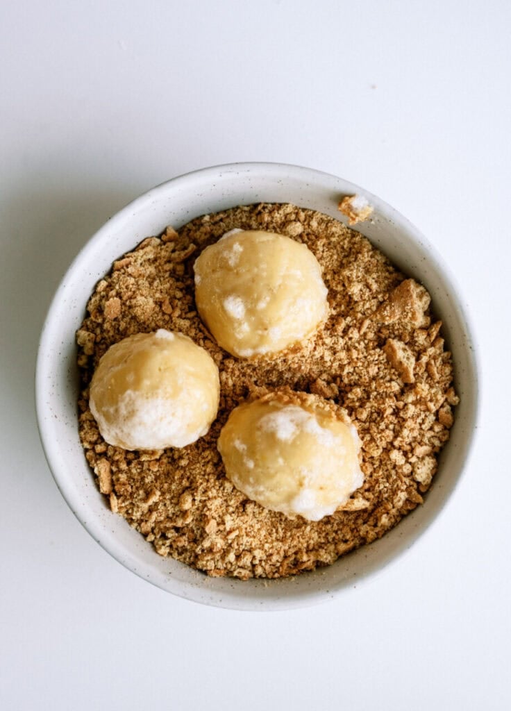 Cookie dough balls dipped in egg white and then in the graham cracker crumbs.