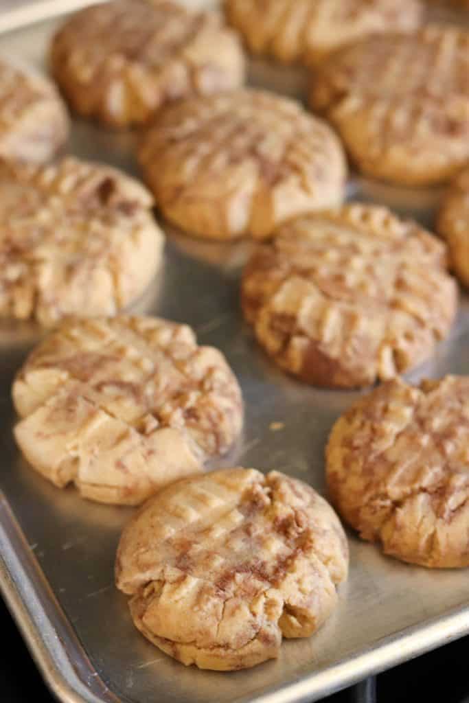 A pan of Peanut Butter Nutella Swirl Cookies lined up.