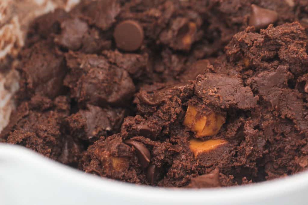 Chocolate Caramel Nutella Cookie dough in a mixing bowl.