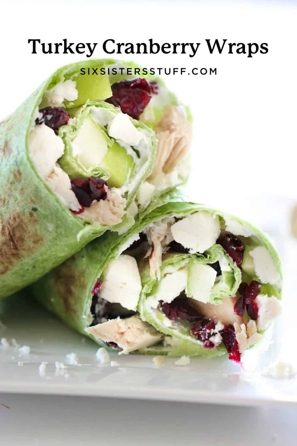 turkey, craisins, apples, and feta cheese wrapped up in a tortilla