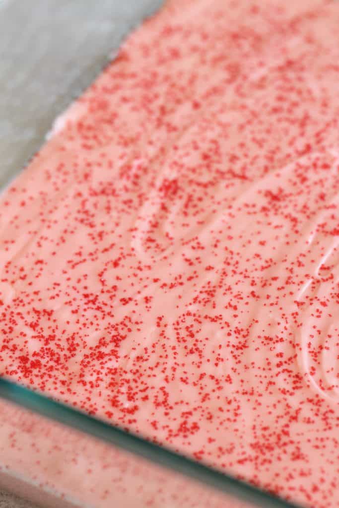 Two Ingredient Strawberry Fudge in a dish with sprinkles on top.