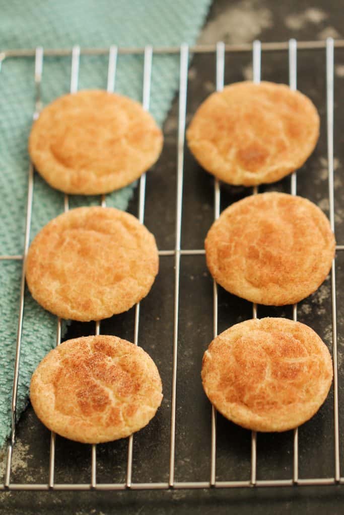 Snickerdoodle Cookies cooling on a cooling rack.