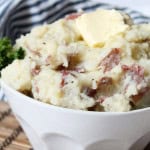 Garlic Parmesan Mashed Potatoes in a white bowl.