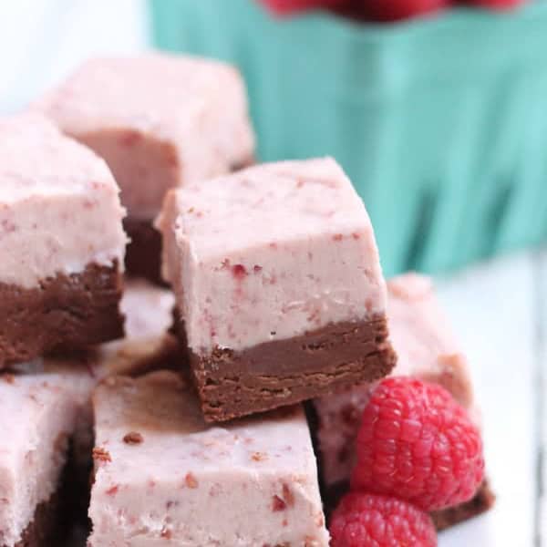 chocolate raspberry fudge stacked on a plate