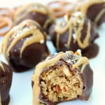 Chubby Hubby Buckeye Peanut Butter Truffles with a close up of one missing a bite.