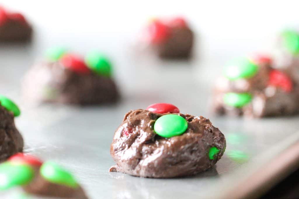 Cake Mix Christmas Cookie dough in little balls on a baking sheet.