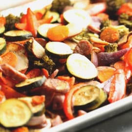 one pan chicken sausage and vegetables on a sheet pan