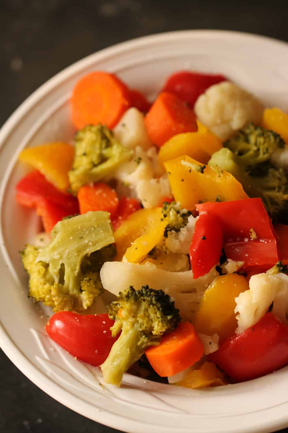 https://www.sixsistersstuff.com/wp-content/uploads/2020/04/Instant-Pot-Perfectly-Steamed-Vegetables-in-bowl-for-six-sisters-stuff.jpg