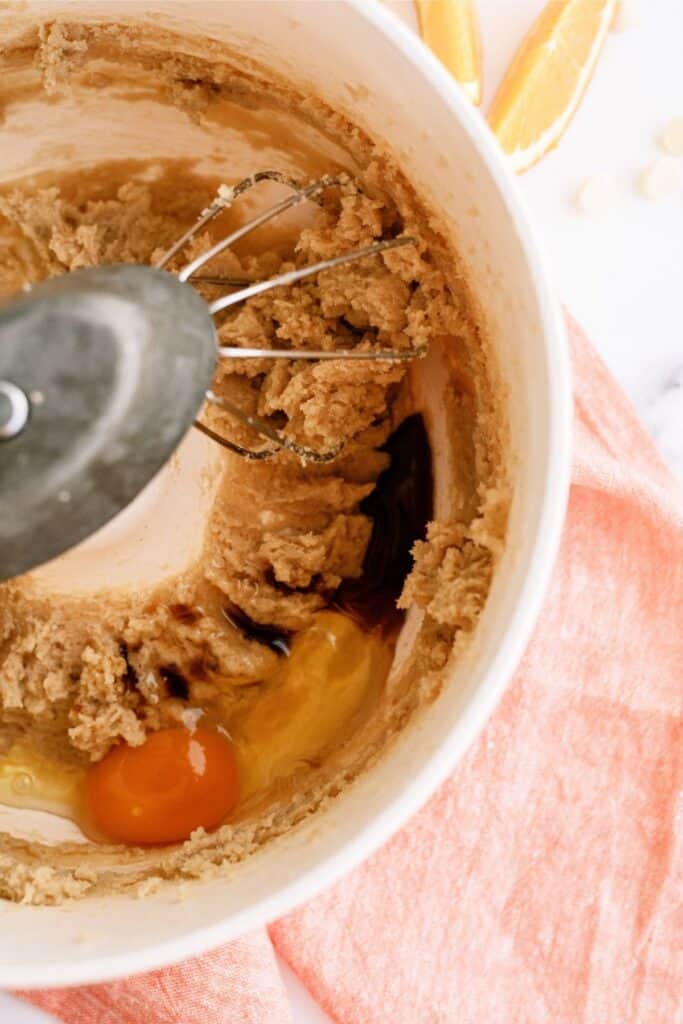 Mixing Orange Creamsicle Cookie dough ingredients together in a stand mixer.