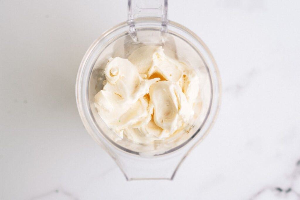 Vanilla Ice Cream inside a blender.