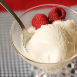 Scoops of Old Fashioned Homemade Vanilla Ice Cream in an ice cream dish