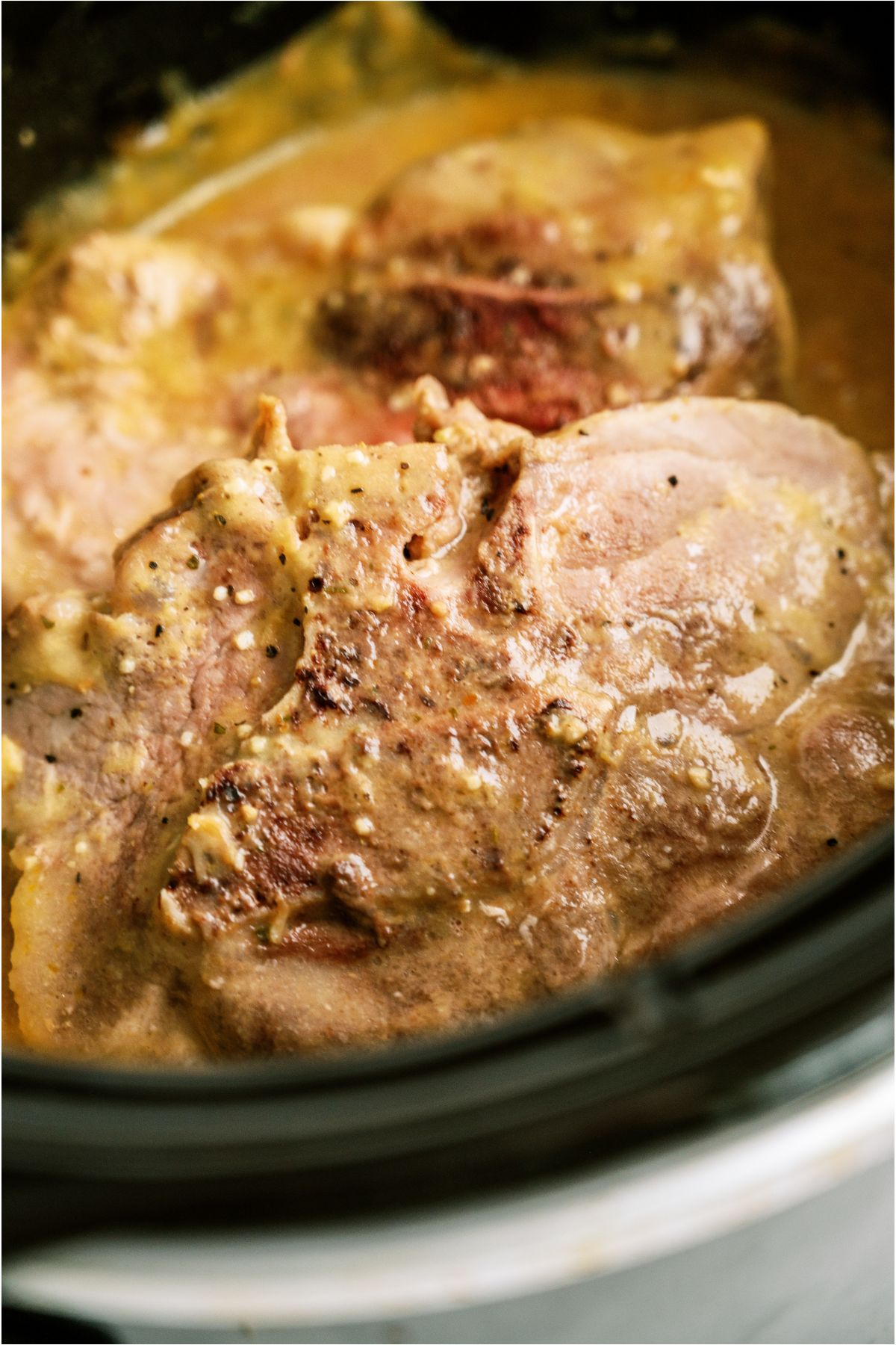 Slow Cooker Pork Chops (5 Ingredients) in the slow cooker.