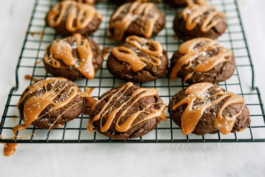 Salted Caramel Chocolate Cookies on a cooking rack.