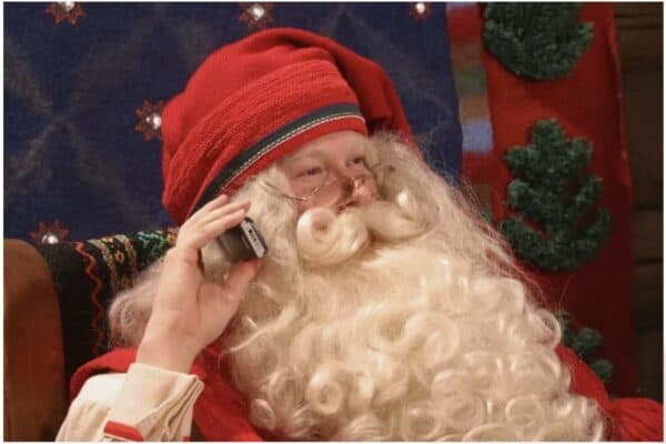 Santa Clause talking on a cell phone