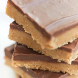 Easy No Bake Peanut Butter Bars cut into squares and stacked