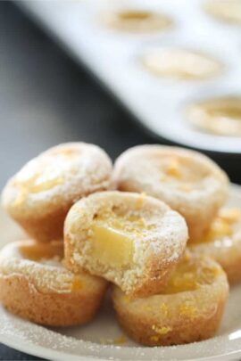 Lemon Bar Cookie Cups stacked on a plate