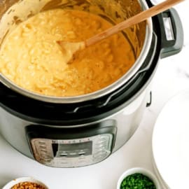 Instant Pot Loaded Mac and Cheese in the cooker with small side dishes