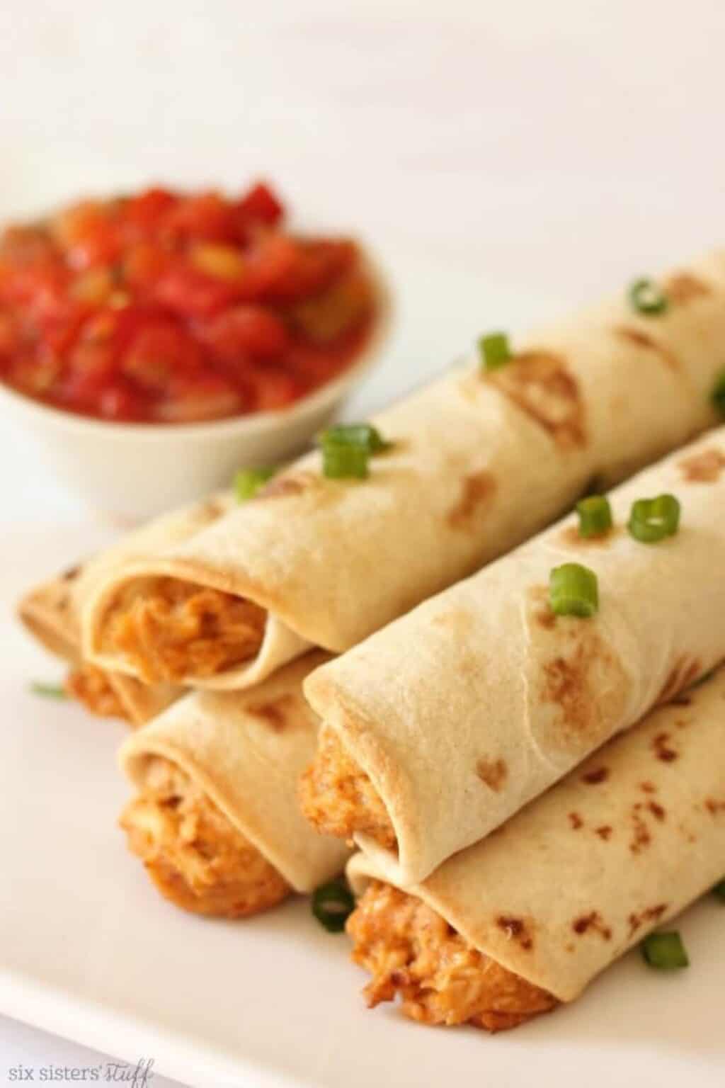 Slow Cooker Cheesy Chicken Taquitos Recipe - Six Sisters' Stuff