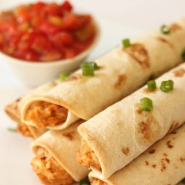 Slow Cooker Cheesy Chicken Taquitos Recipe - Six Sisters' Stuff