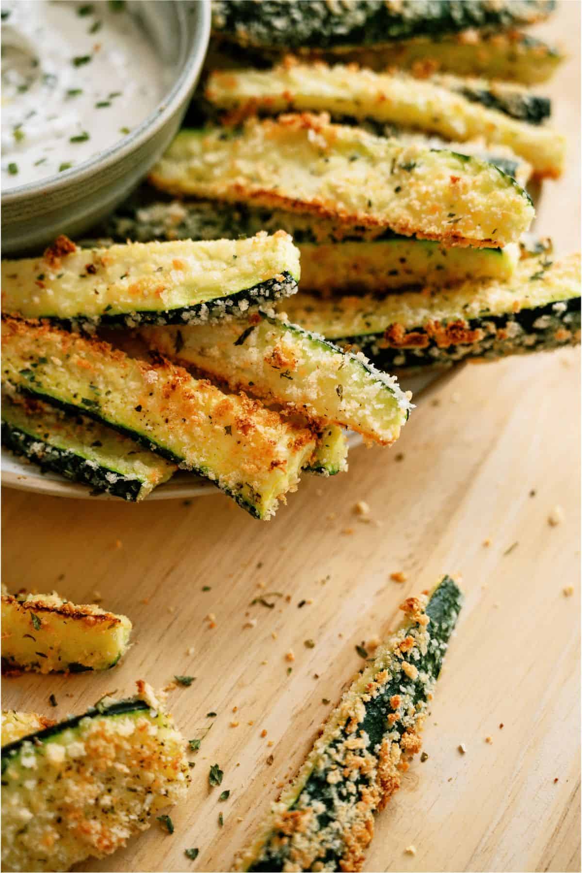 Baked Zucchini Fries on a cutting board