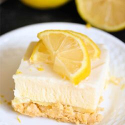 A slice of Frozen Lemon Fluff Dessert on a plate