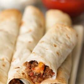 Baked Beef Taquitos on a plate