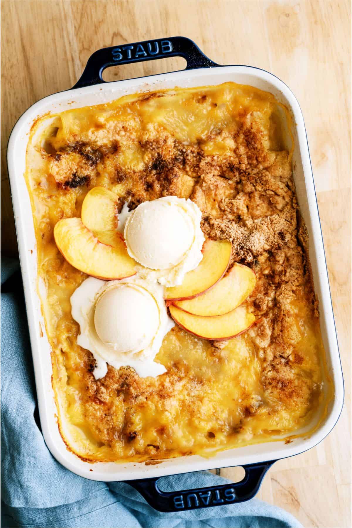 Peach Cobbler Dump Cake (4 Ingredients) in baking dish