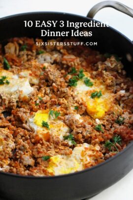 A pan filled with a cooked dish consisting of ground meat, eggs, and garnished with parsley.