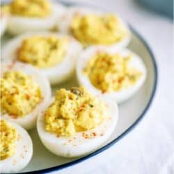 Deviled Eggs on a serving plate on a white background.