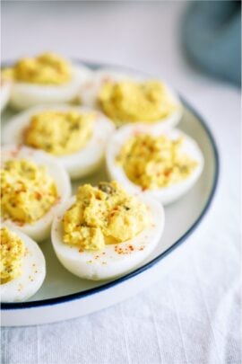 Deviled Eggs on a serving plate on a white background.