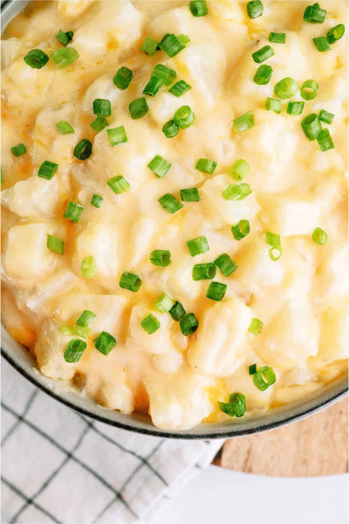 Top view of Slow Cooker Cheesy Potatoes in a serving bowl