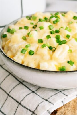 Slow Cooker Cheesy Potatoes in a serving bowl