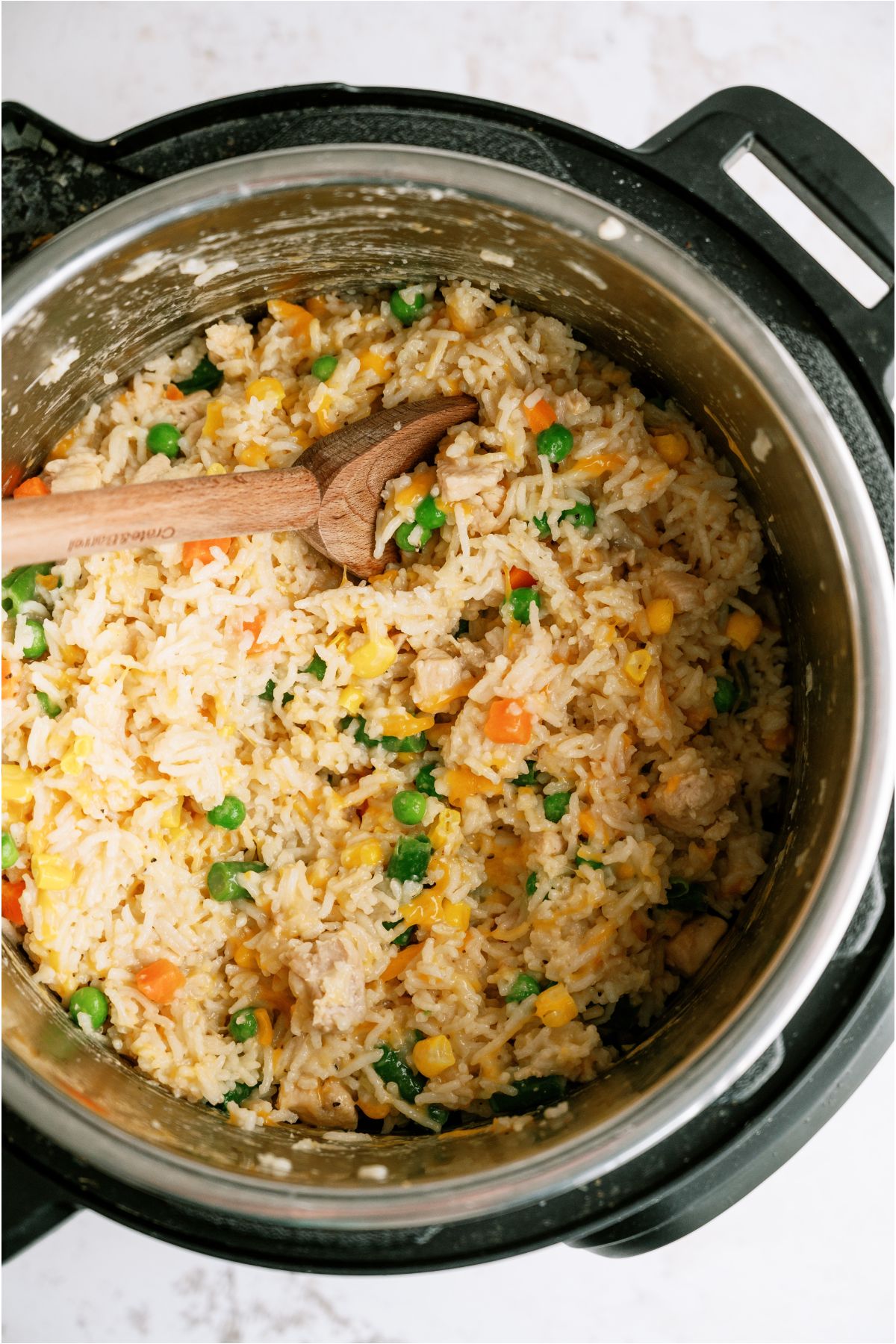 Top view of Instant Pot Cheesy Chicken and Rice inside the Instant Pot.