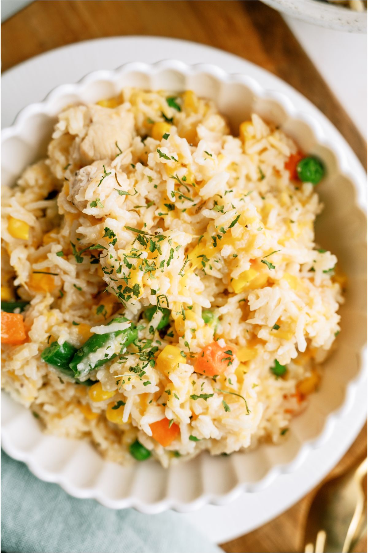 Top view of a large bowl of Instant Pot Cheesy Chicken and Rice.