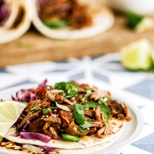 slow cooker beef carnitas on a plate