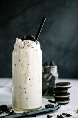 Copycat Dairy Queen Blizzard in a glass surrounded by Oreo cookies