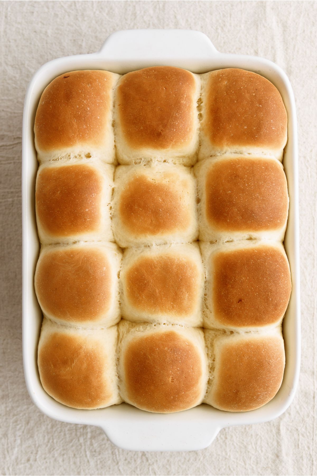 Freshly baked 30 Minute Homemade Rolls in baking dish.