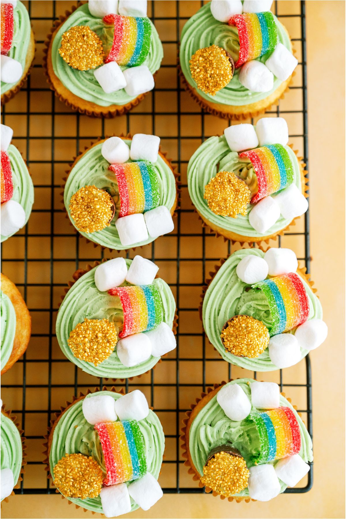 Top view of St. Patrick's Day Cupcakes on top of a cooling rack.