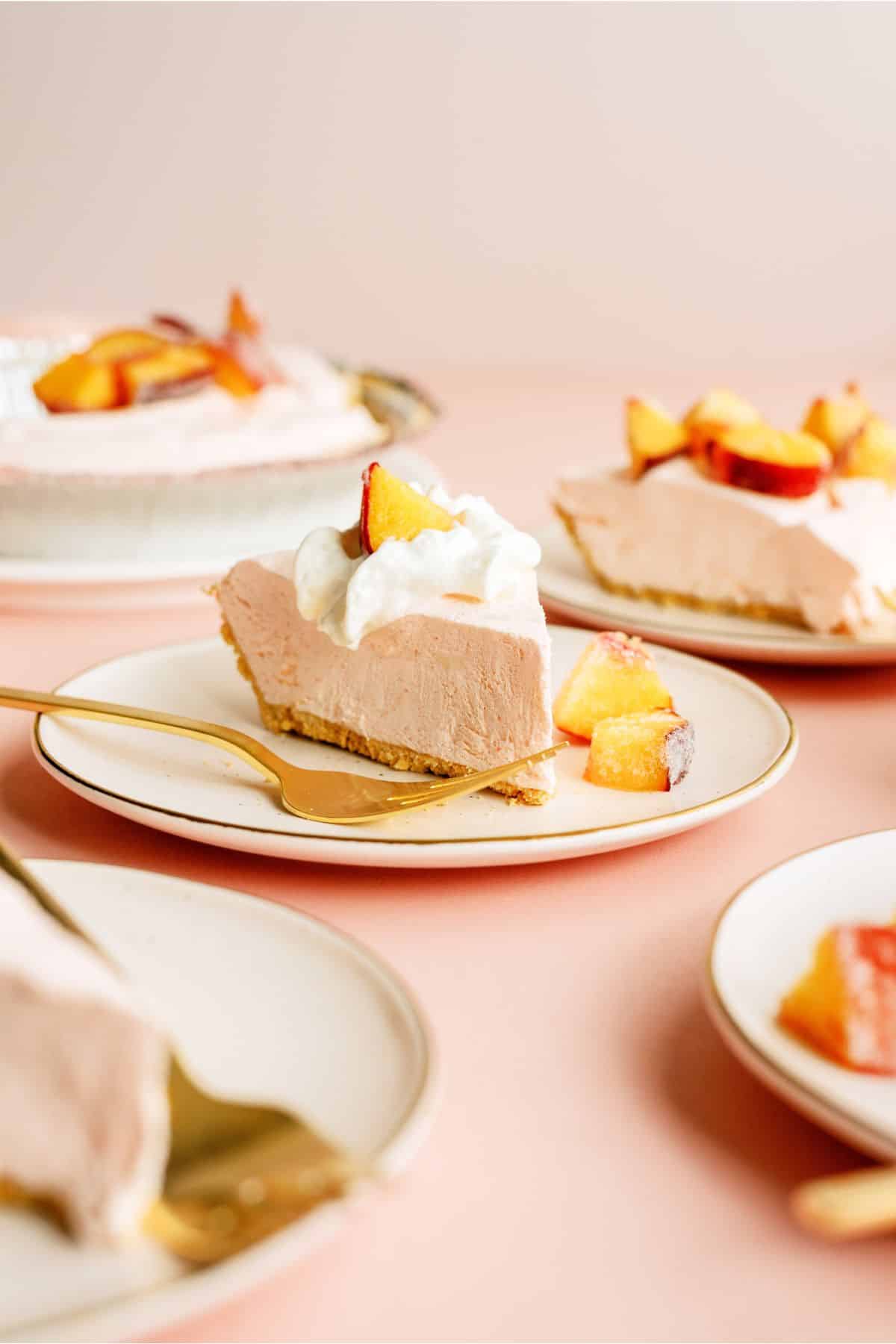 Slices of Creamy Peach Pie on plates