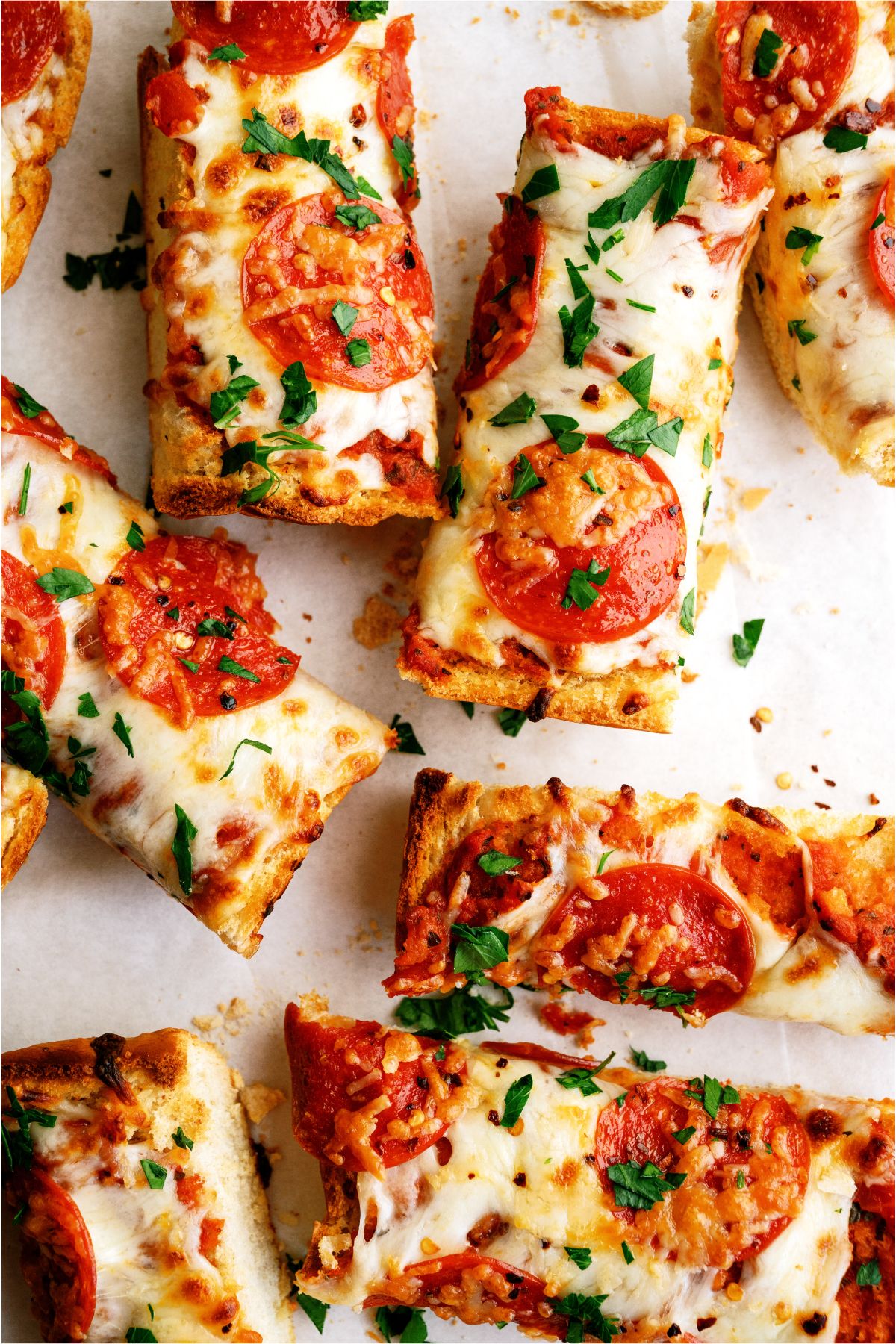 Air Fryer French Bread Pizza sliced into thin strips