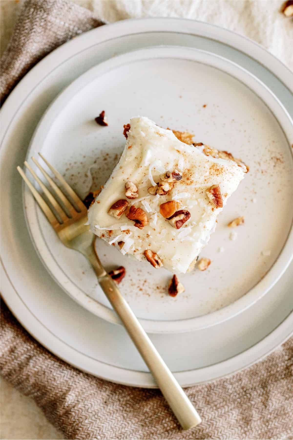 A slice of Preacher Cake on a plate with a fork