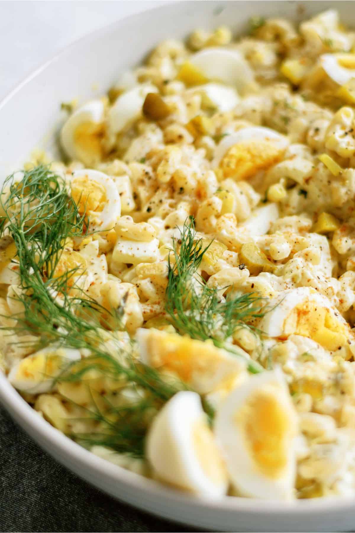 Close up of Deviled Egg Pasta Salad in a large bowl