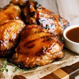 Grilled Honey Balsamic Chicken on a cutting board