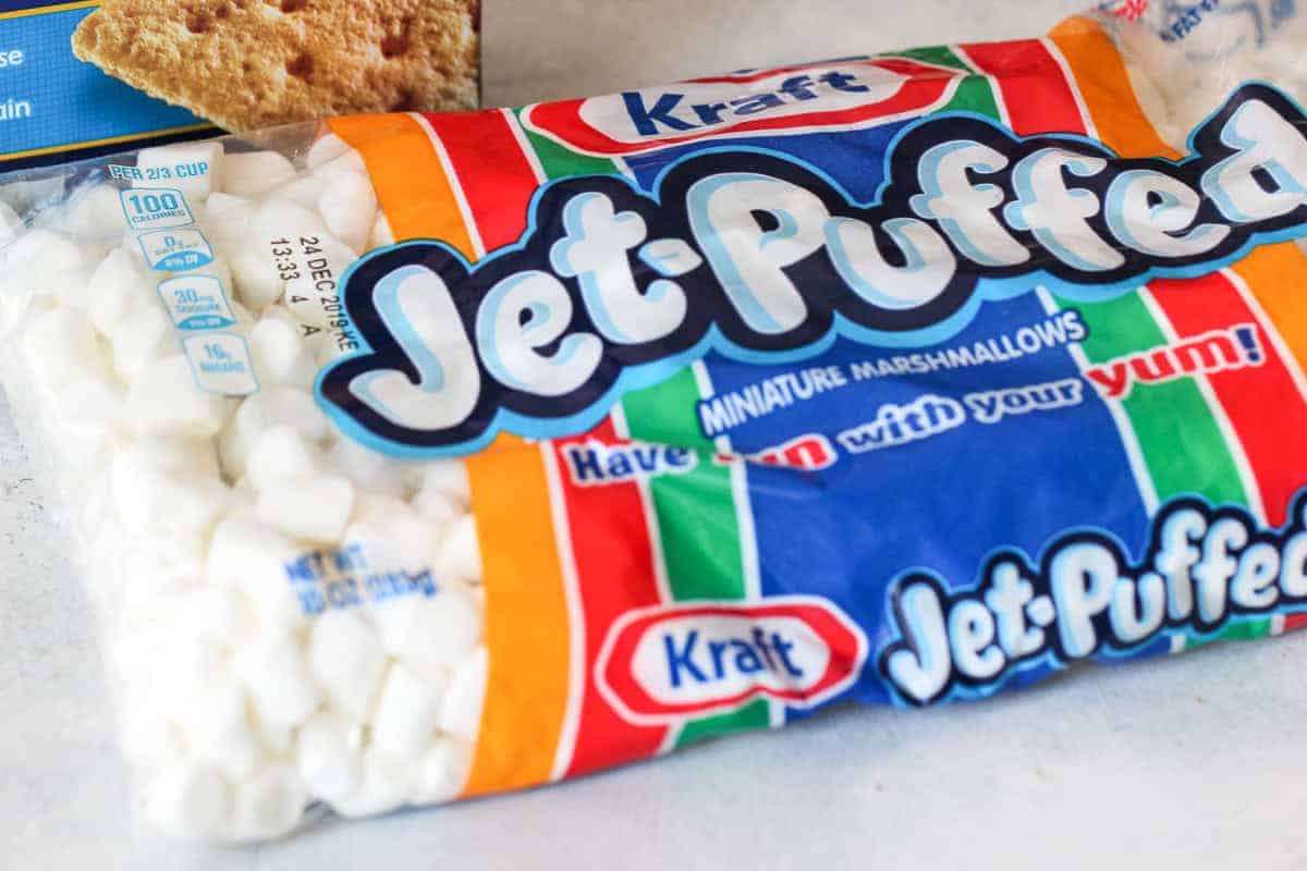 A bag of Kraft Jet-Puffed miniature marshmallows with nutrition information and branding visible on the packaging.