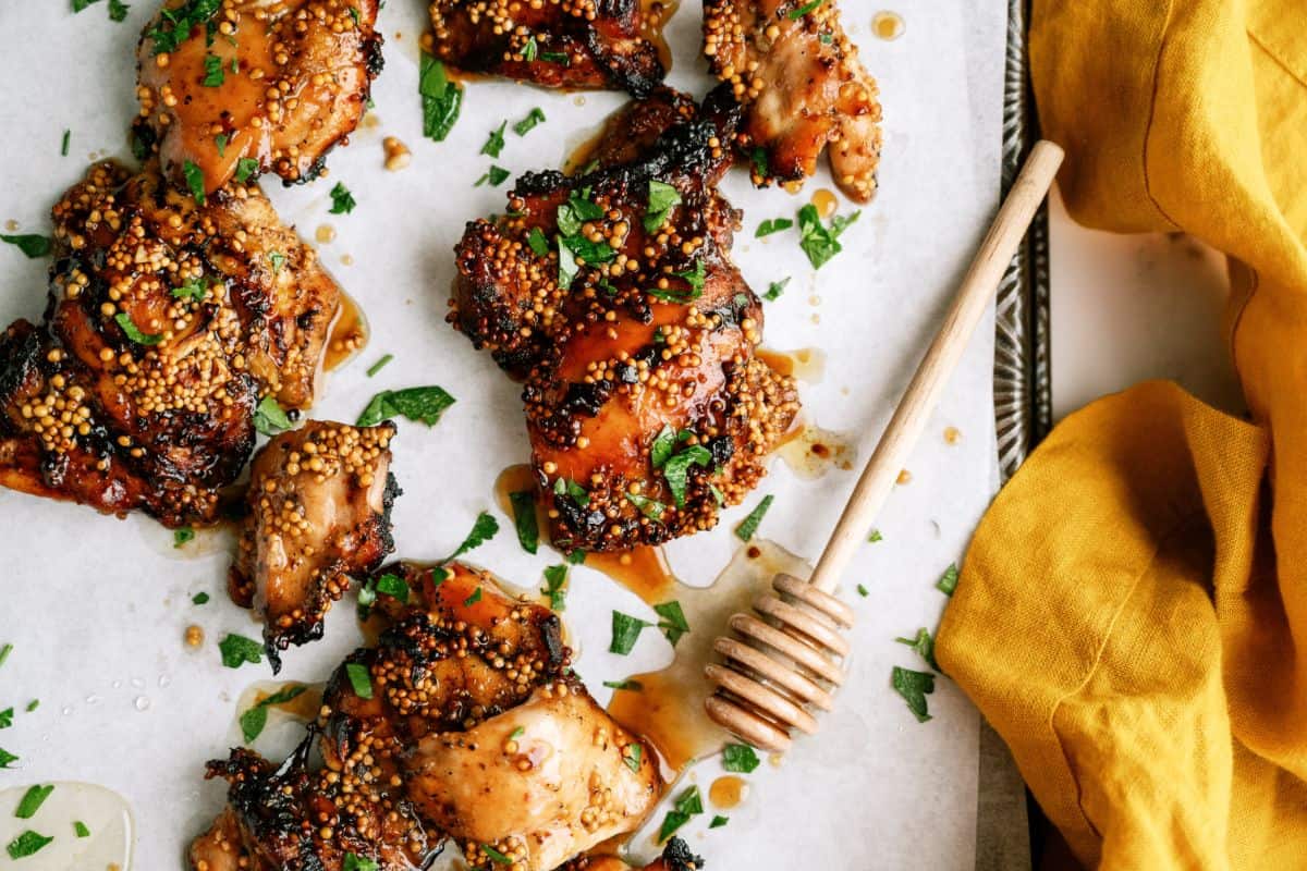 Honey Mustard Grilled Chicken Thighs on a baking sheet