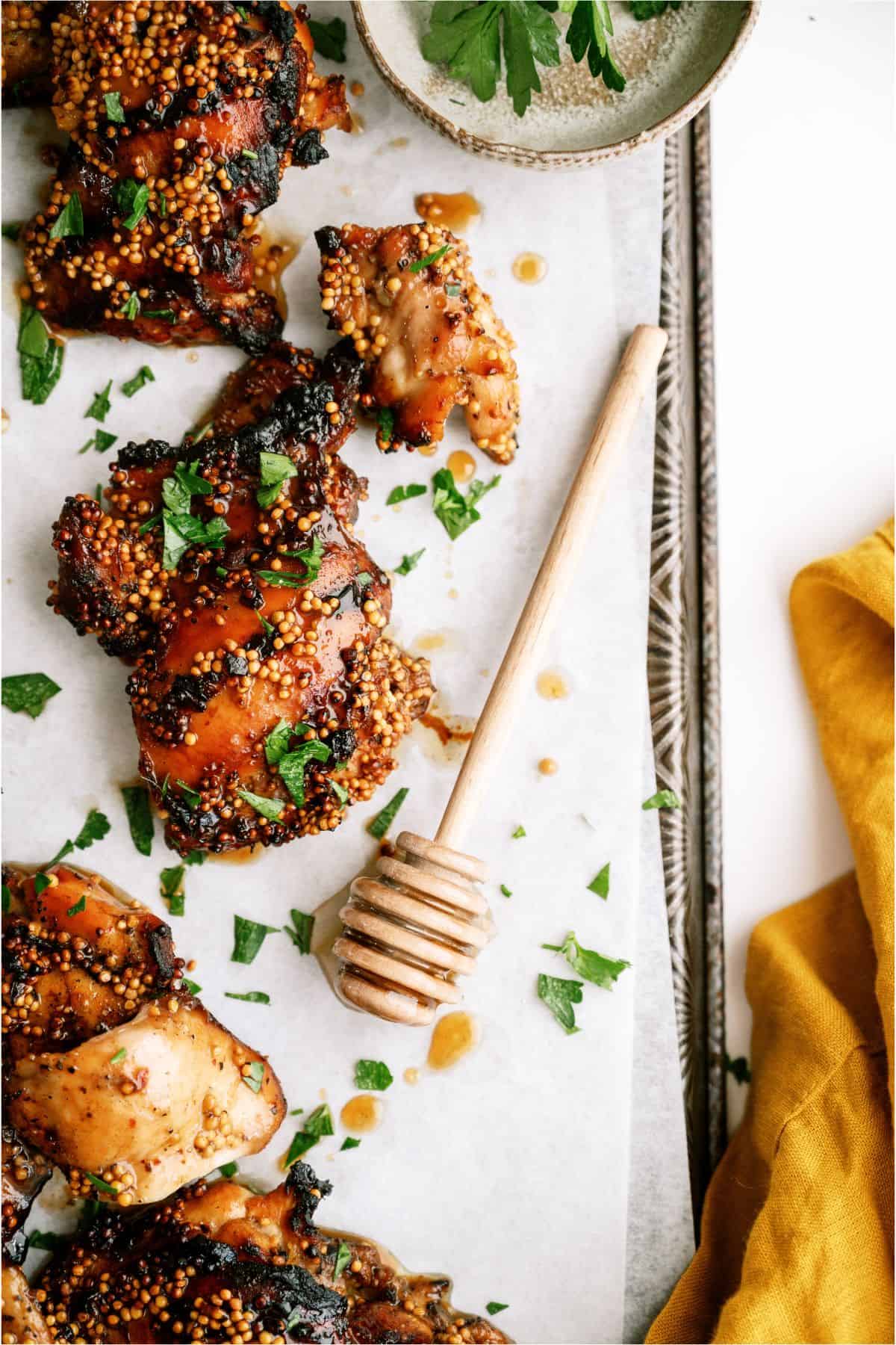 Honey Mustard Grilled Chicken Thighs on parchment paper