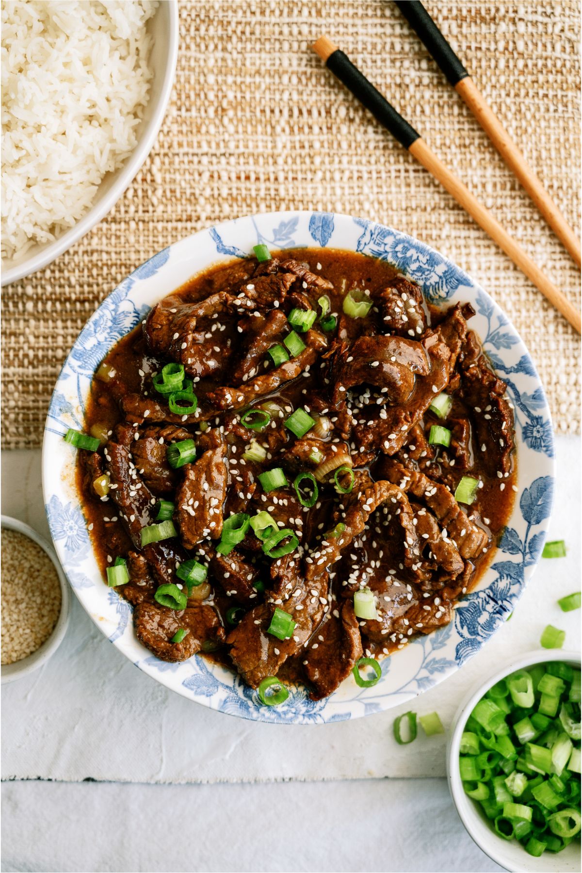 Top view of a bowl of Slow Cooker Korean Beef topped with sesame seeds